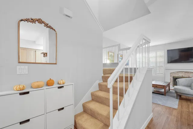a kitchen with a sink and refrigerator