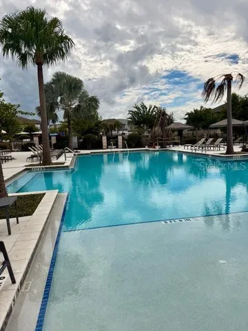 a view of a couches with wooden floor