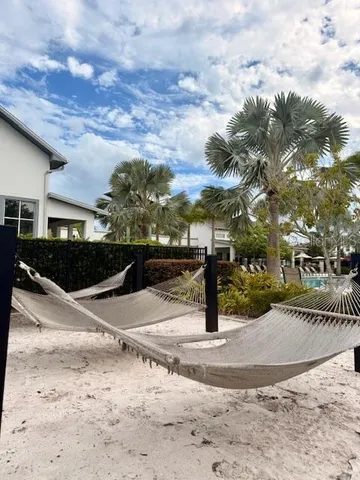 a view of a swimming pool with patio