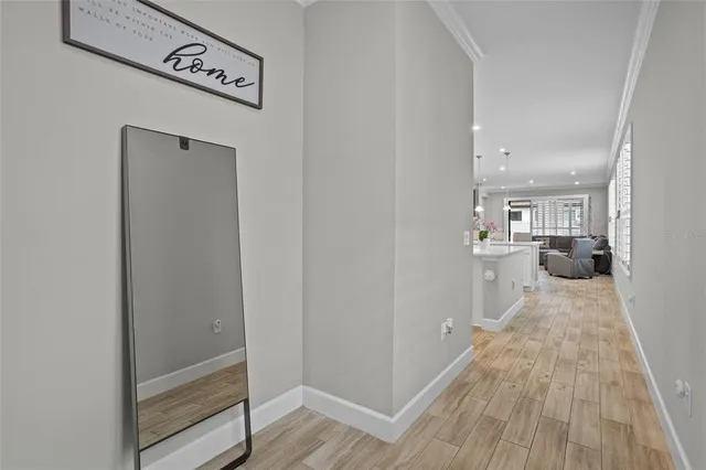 a view of a kitchen from the hallway