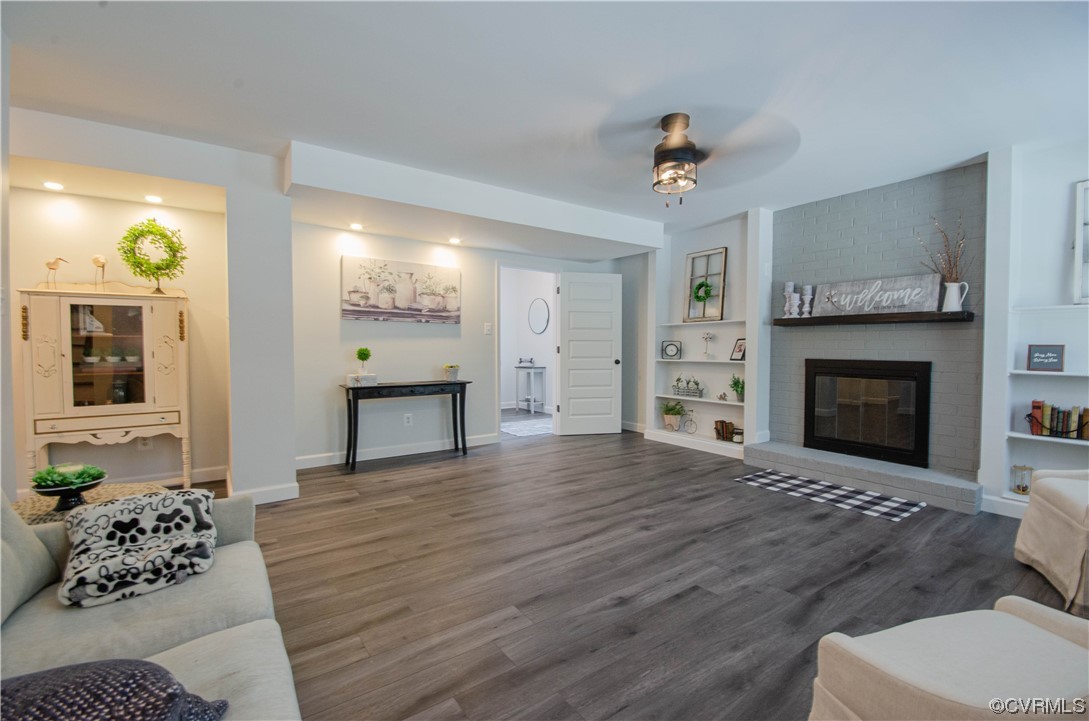 15073 Neck Trail Doswell, VA 23047 - Photo 27 of 50 a living room with furniture and a fireplace