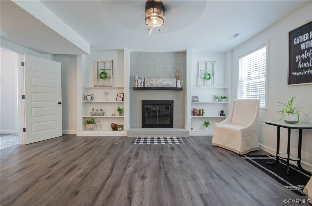 15073 Neck Trail Doswell, VA 23047 - Photo 28 of 50 a living room with furniture and a fireplace
