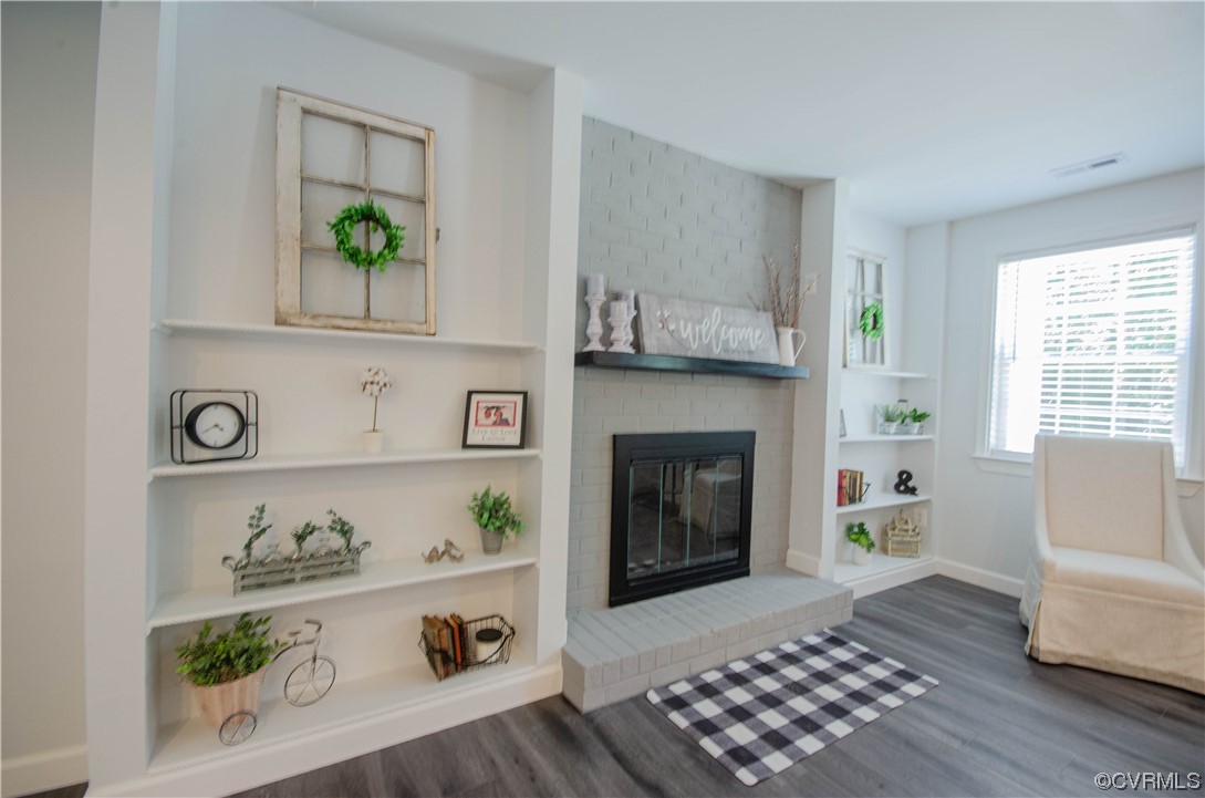 15073 Neck Trail Doswell, VA 23047 - Photo 29 of 50 a living room with furniture and a fireplace