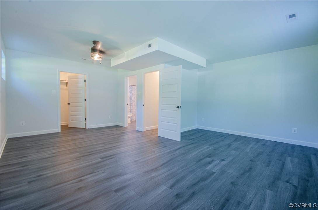 15073 Neck Trail Doswell, VA 23047 - Photo 33 of 50 an empty room with wooden floor and windows