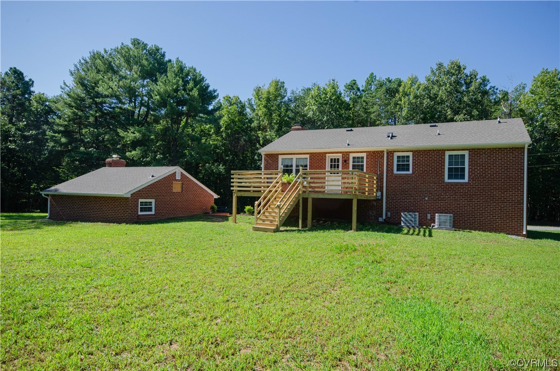 15073 Neck Trail Doswell, VA 23047 - Photo 37 of 50 a house with a big yard and large trees