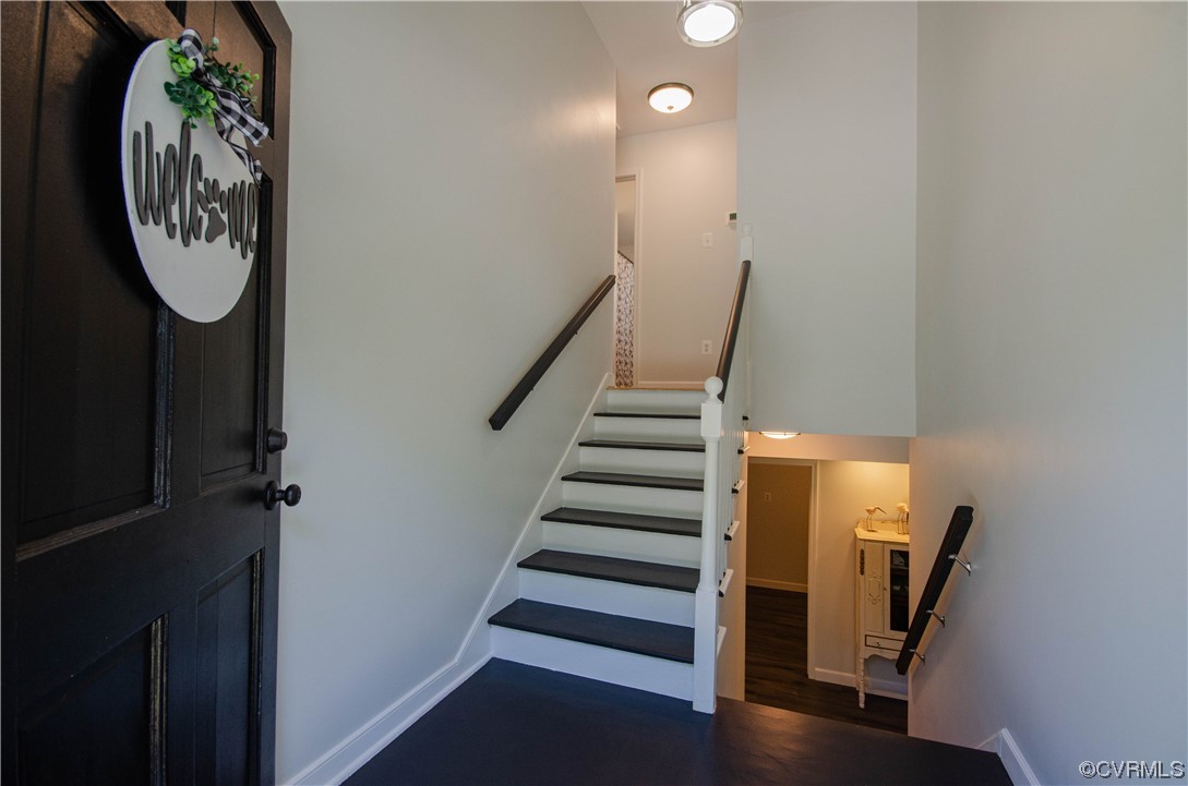 15073 Neck Trail Doswell, VA 23047 - Photo 5 of 50 a view of a hallway with wooden floor and entryway