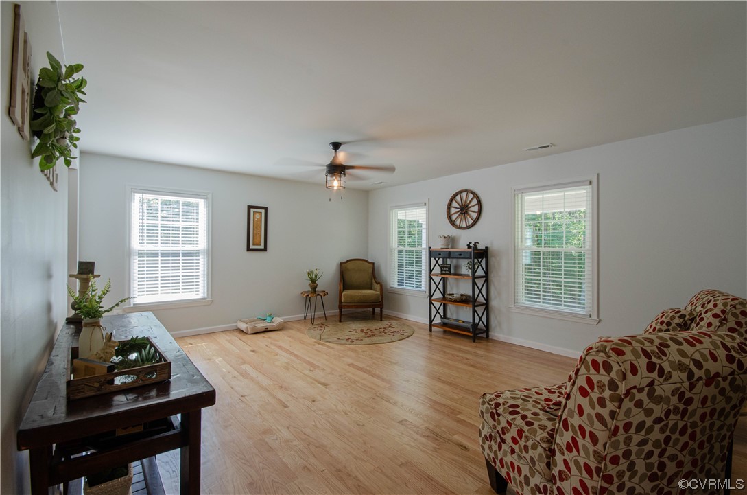 15073 Neck Trail Doswell, VA 23047 - Photo 8 of 50 a bed room with a bed and a chair