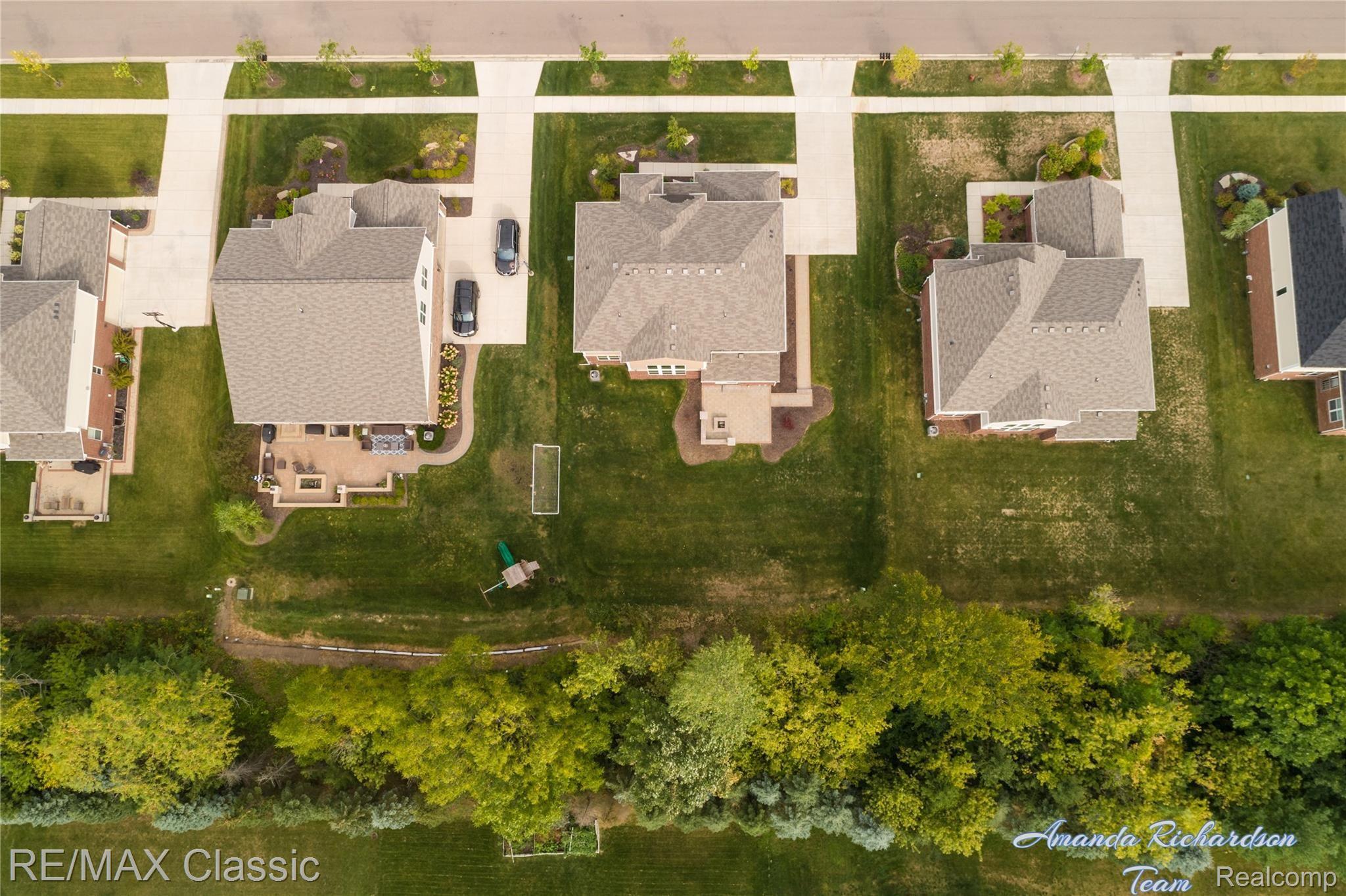 1475 Hickory Ridge Court South Canton, MI 48187 - Photo 30 of 32 Tree lined property line provides additional privacy