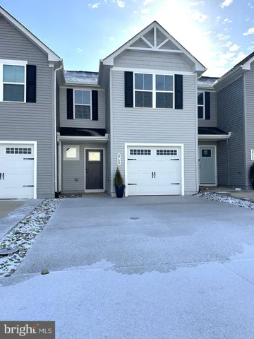 a view of a house with a garage