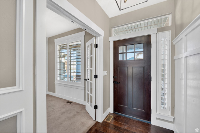 14714 South Bright Wood Road Herriman, UT 84096 - Photo 6 of 41 Entryway featuring baseboards and dark wood finished floors