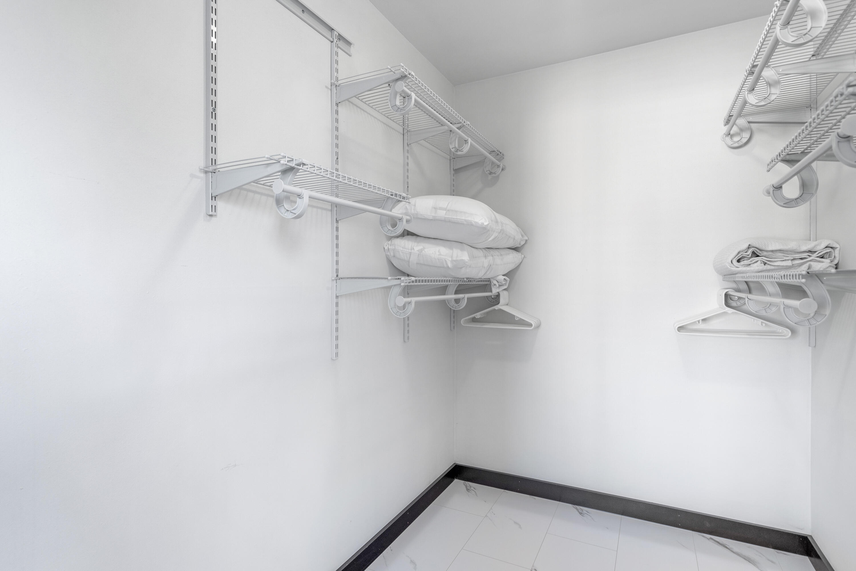4100 Dancing Cloud Court, Unit 287 Destin, FL 32541 - Photo 13 of 26 a view of small space with racks on the wall