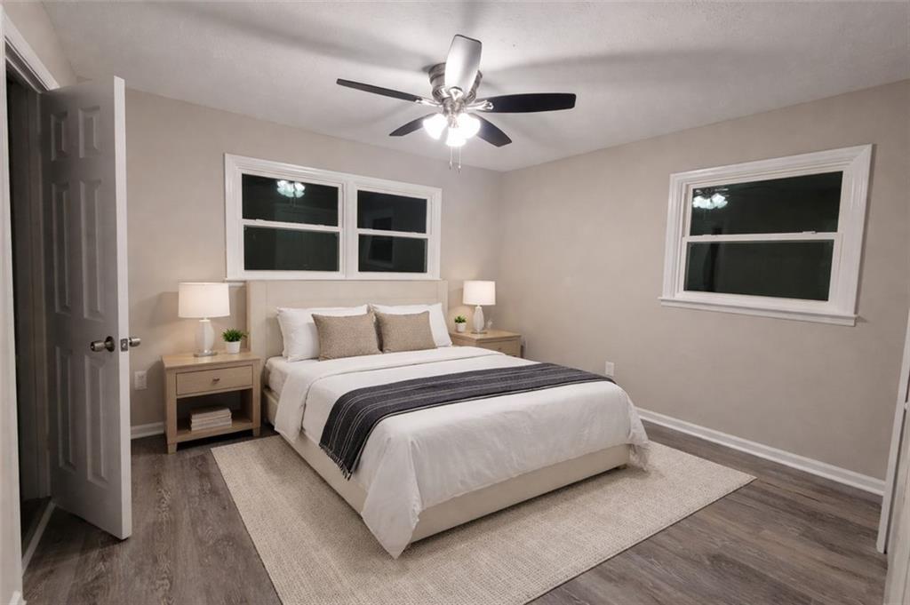 4059 Canby Lane Decatur, GA 30035 - Photo 12 of 18 a bedroom with a large bed and a window