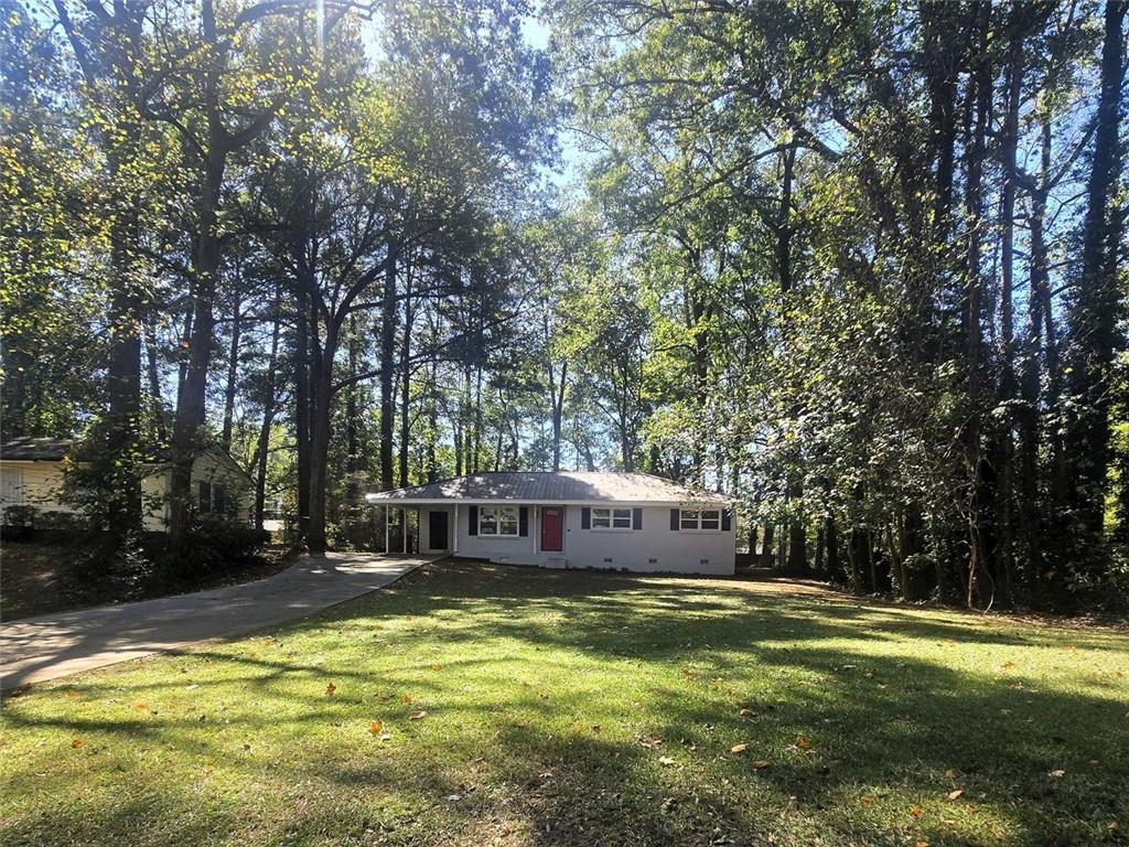 4059 Canby Lane Decatur, GA 30035 - Photo 16 of 18 a view of a swimming pool with a big and large trees
