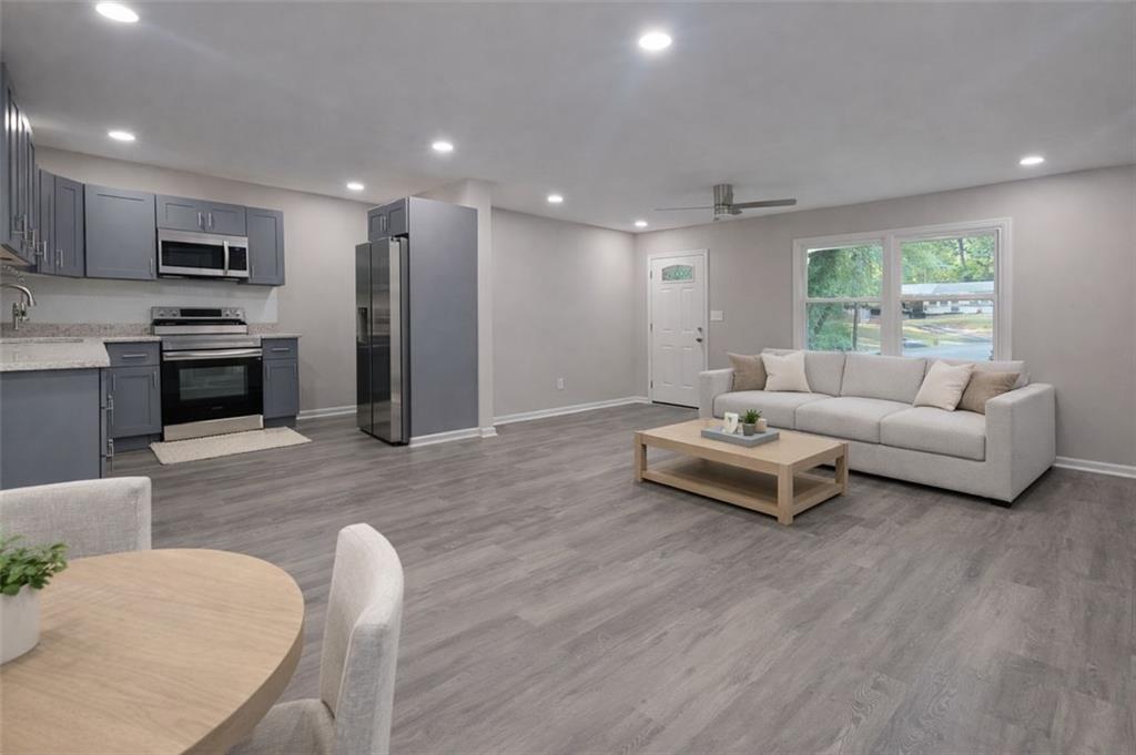 4059 Canby Lane Decatur, GA 30035 - Photo 3 of 18 a living room with furniture and kitchen view
