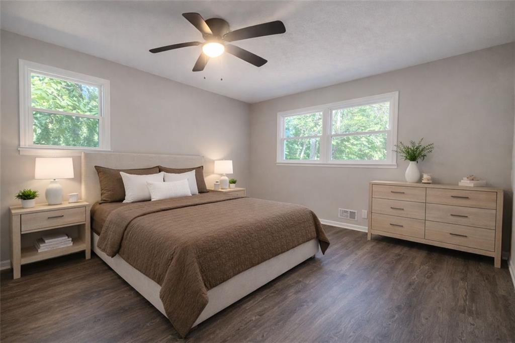 4059 Canby Lane Decatur, GA 30035 - Photo 7 of 18 a bed room with a bed and a window