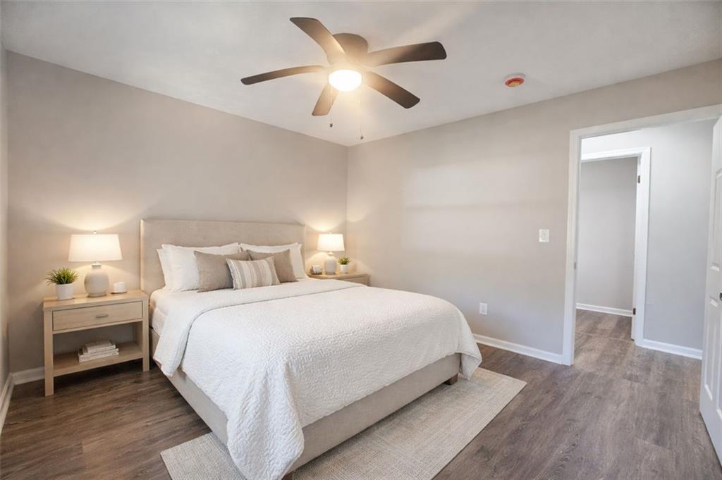 4059 Canby Lane Decatur, GA 30035 - Photo 10 of 18 a bedroom with a bed and a ceiling fan