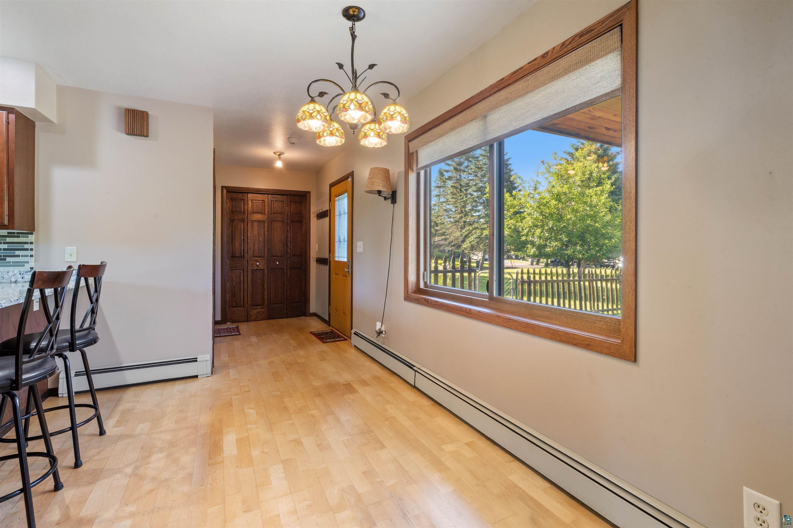 44 Highgate Street Superior, WI 54880 - Photo 9 of 47 Light wood-finish flooring throughout