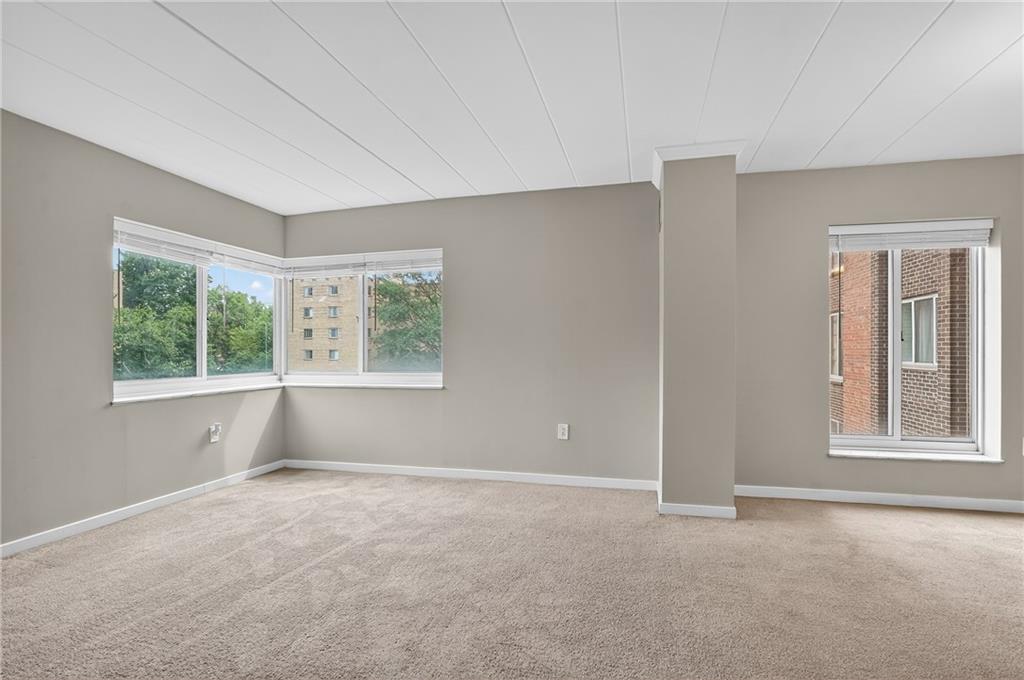 5 Bayard Road, Unit 500 Pittsburgh, PA 15213 - Photo 18 of 45 an empty room with windows and closet
