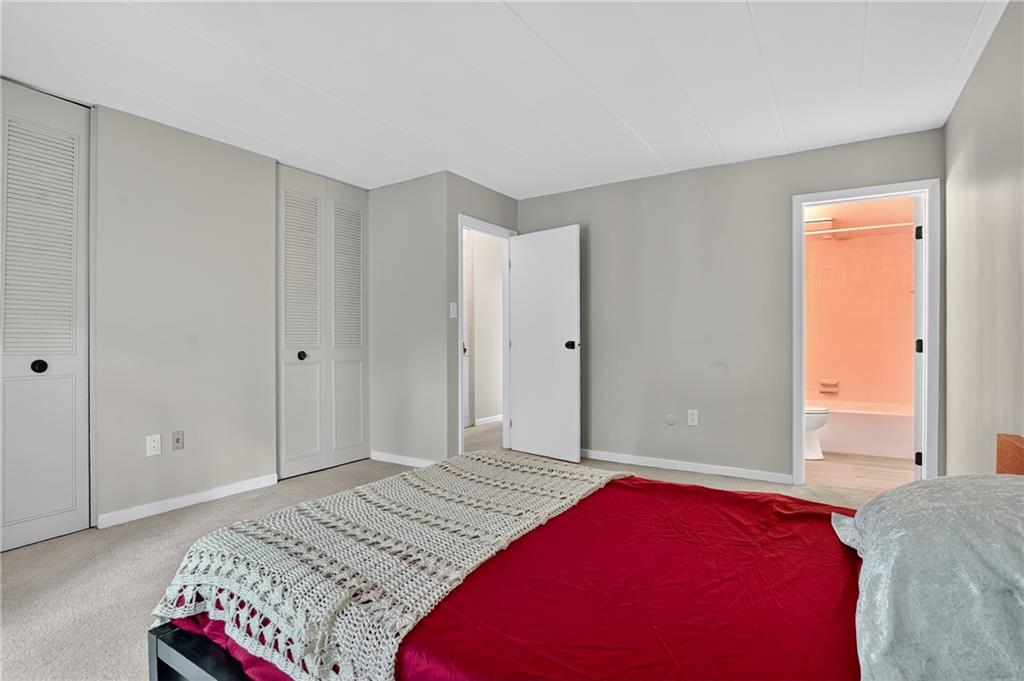 5 Bayard Road, Unit 500 Pittsburgh, PA 15213 - Photo 23 of 45 a bedroom with a bed and a closet