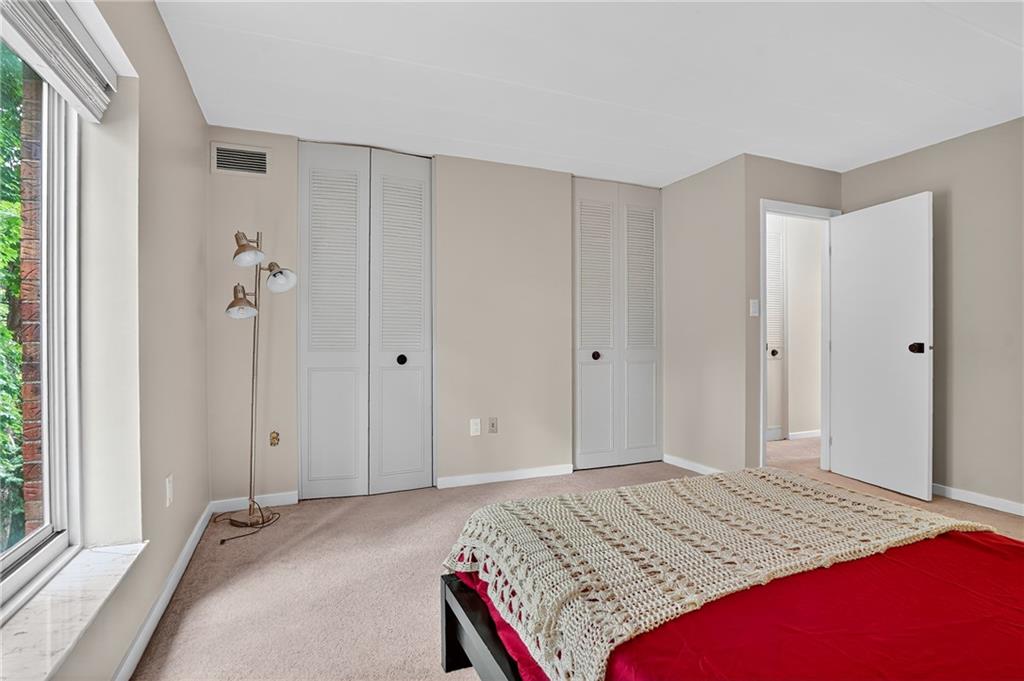 5 Bayard Road, Unit 500 Pittsburgh, PA 15213 - Photo 24 of 45 a bedroom with a bed and a window