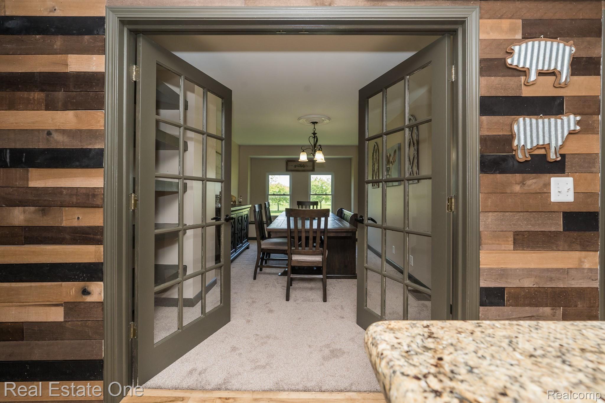 8047 Perry Road Grand Blanc, MI 48439 - Photo 20 of 48 Large Dining Room off kitchen with neat built in shelves.