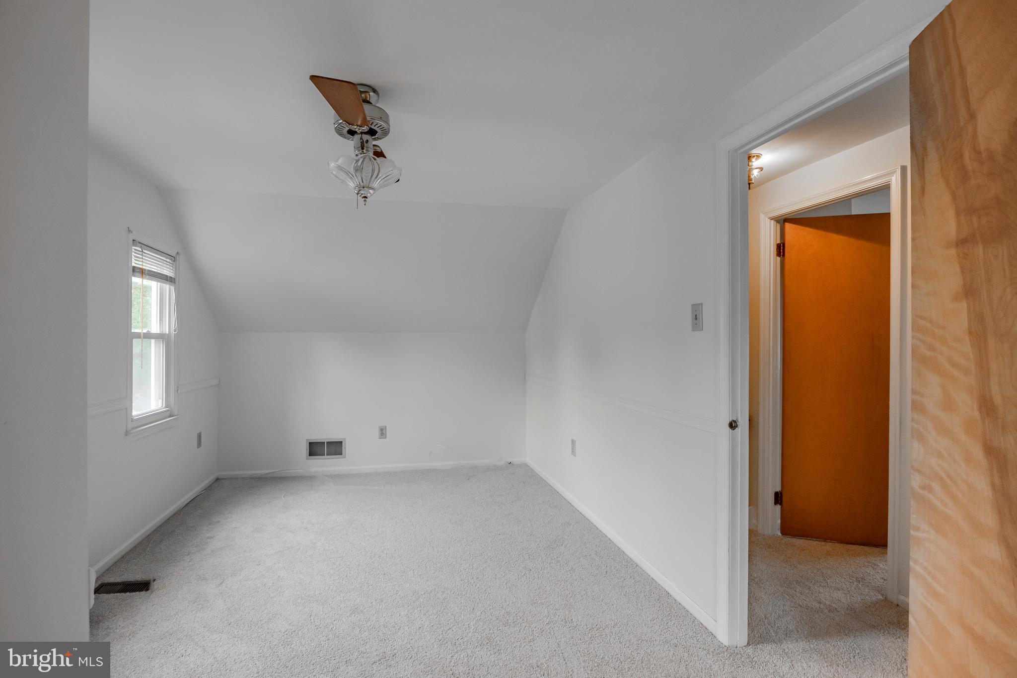 212 Golf Hills Road Havertown, PA 19083 - Photo 14 of 37 an empty room with a empty space and windows