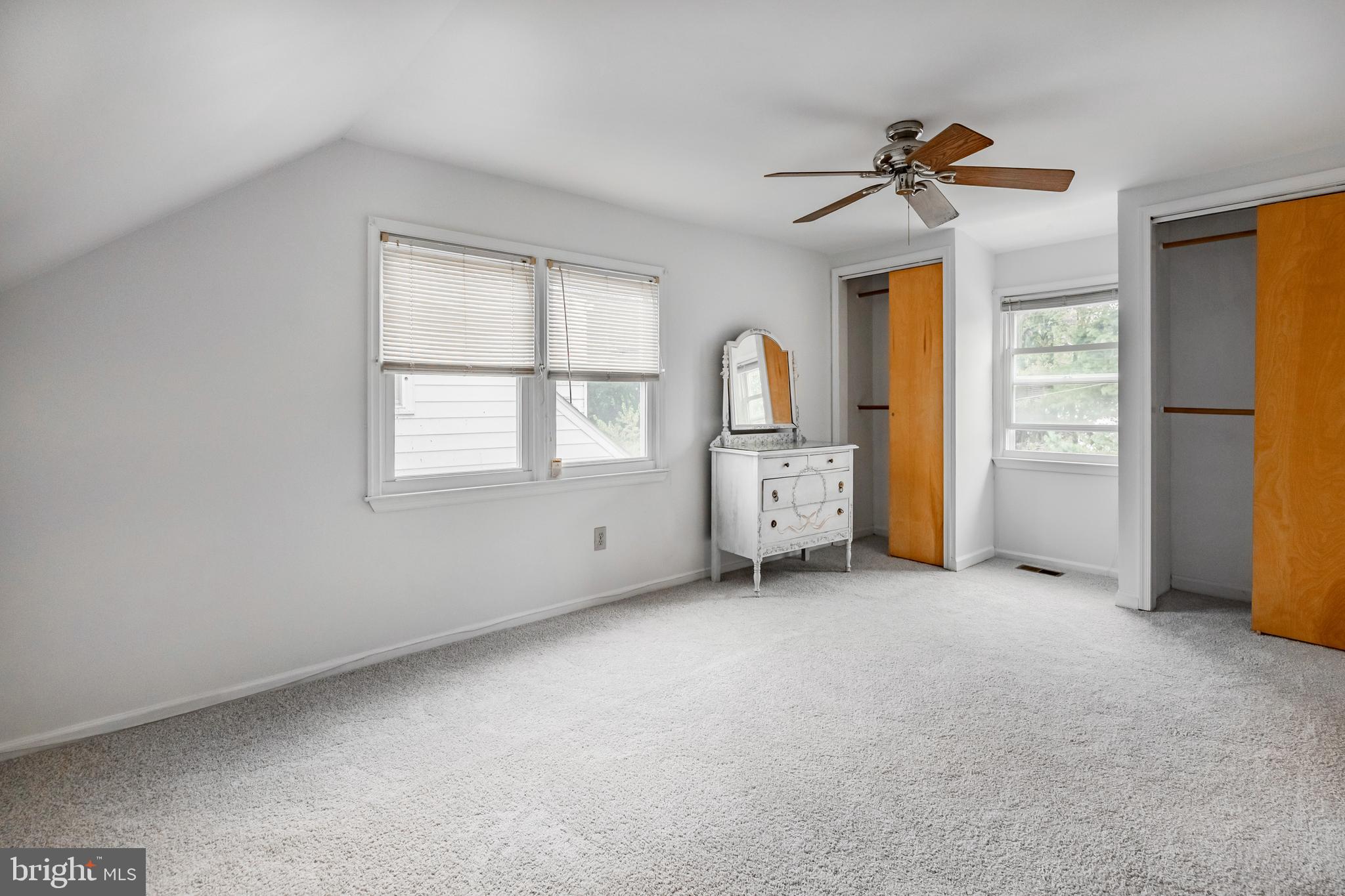 212 Golf Hills Road Havertown, PA 19083 - Photo 16 of 37 an empty room with windows and closet