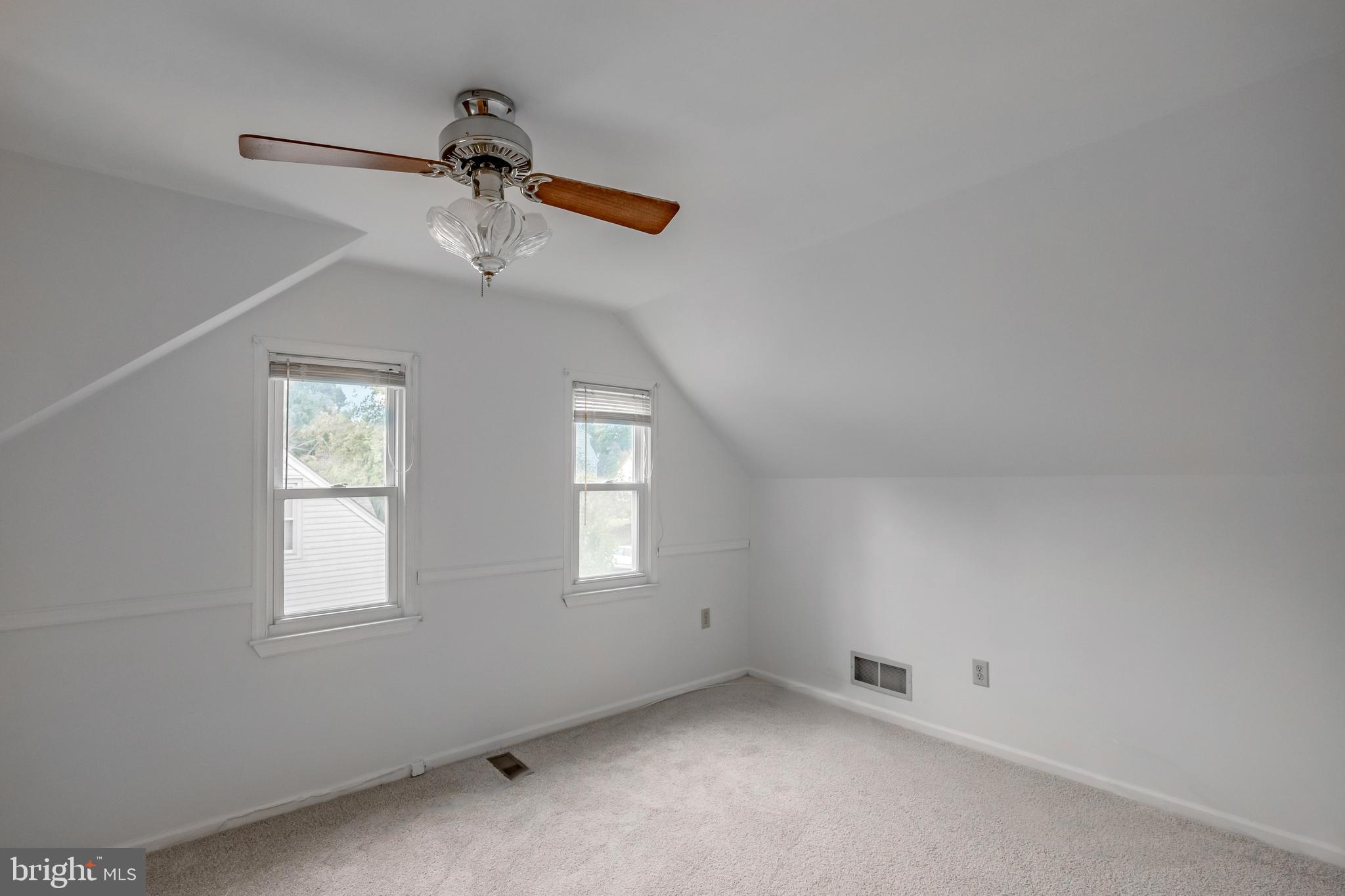 212 Golf Hills Road Havertown, PA 19083 - Photo 20 of 37 a view of an empty room with a window