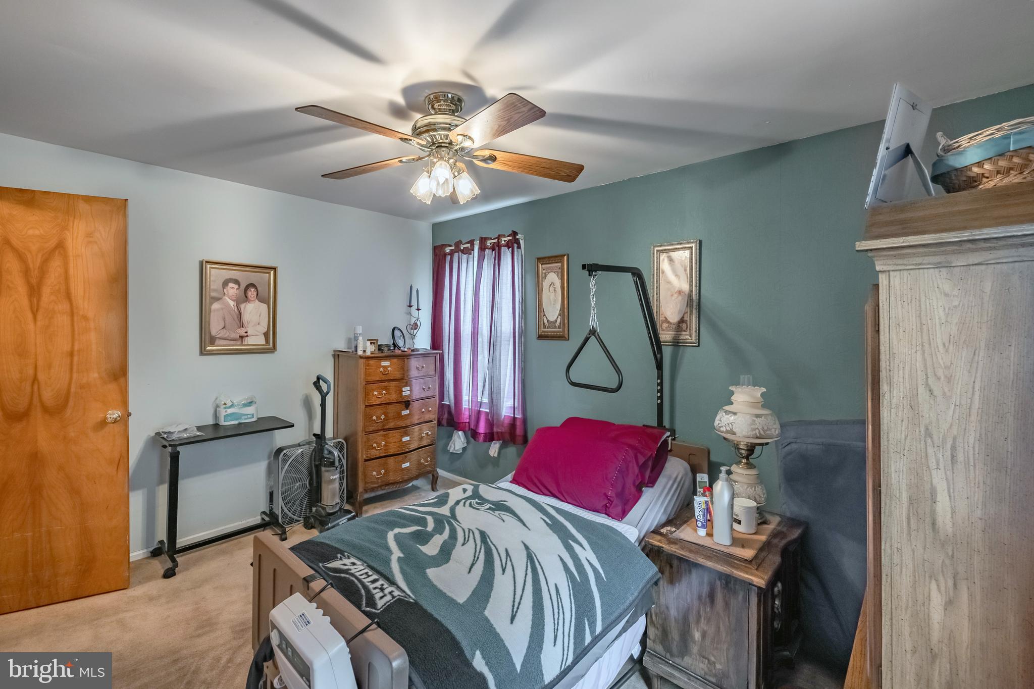 212 Golf Hills Road Havertown, PA 19083 - Photo 23 of 37 a view of a livingroom with furniture and a chandelier fan
