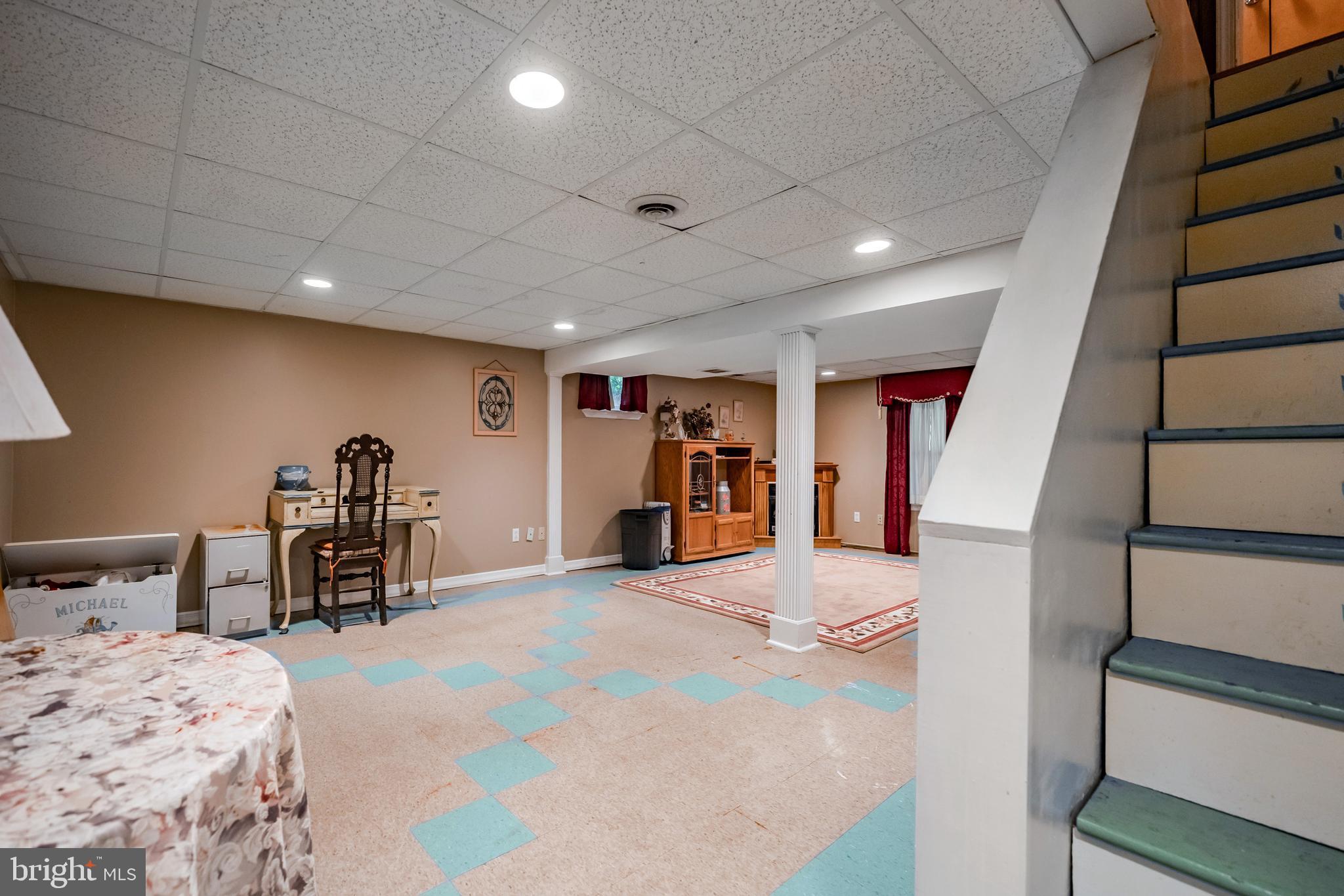 212 Golf Hills Road Havertown, PA 19083 - Photo 29 of 37 a large bedroom with a bed and a large mirror on dresser