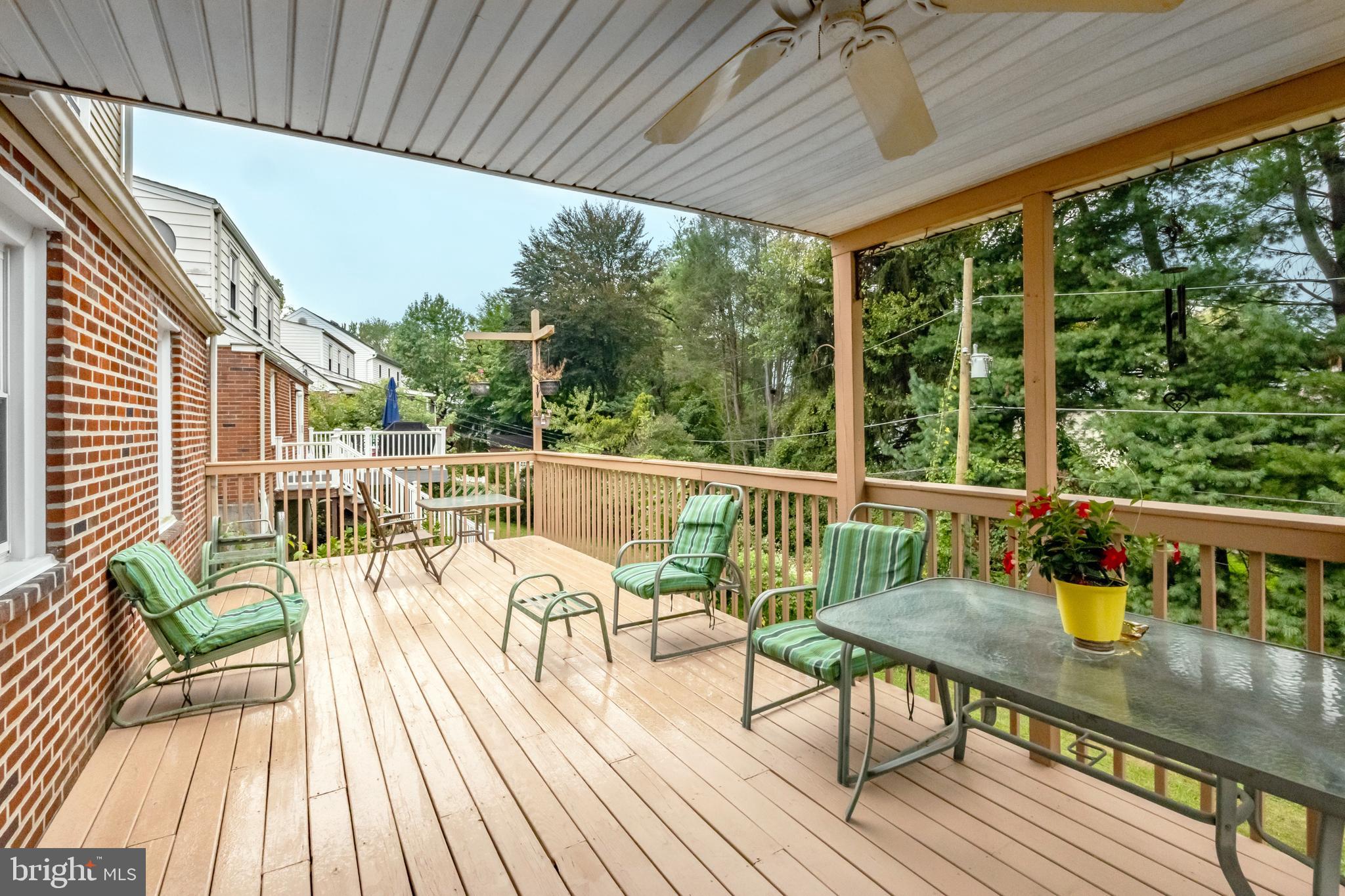 212 Golf Hills Road Havertown, PA 19083 - Photo 31 of 37 a view of a patio with wooden floor