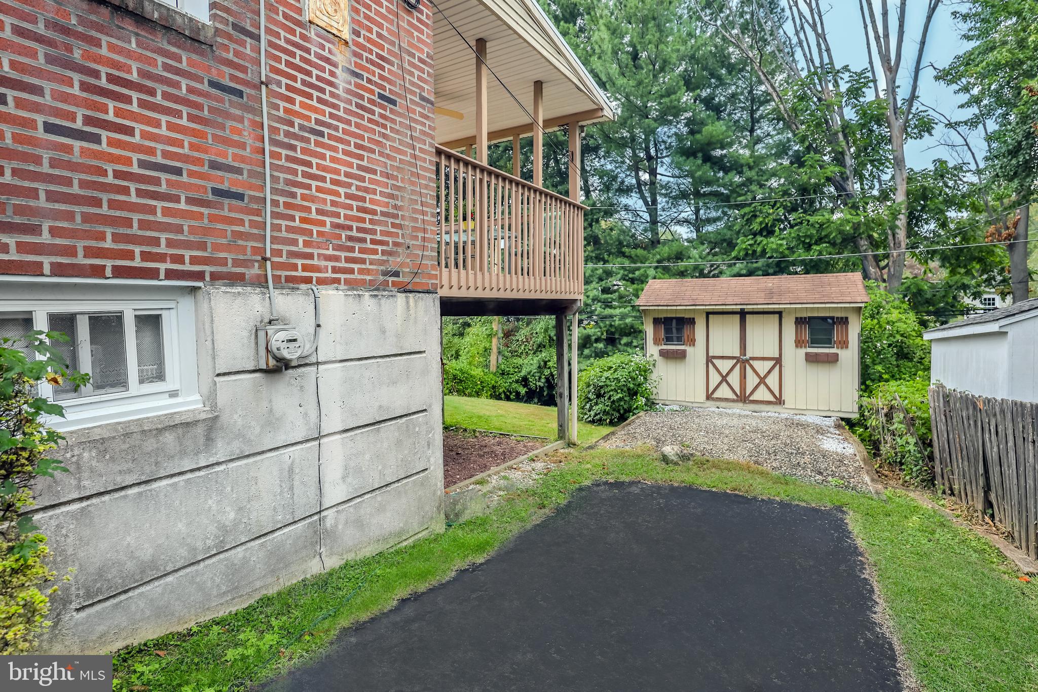 212 Golf Hills Road Havertown, PA 19083 - Photo 33 of 37 a view of house with a yard and potted plants