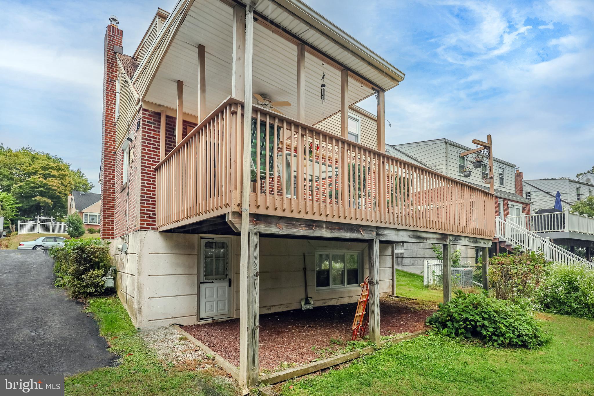 212 Golf Hills Road Havertown, PA 19083 - Photo 34 of 37 a view of a house with backyard and porch