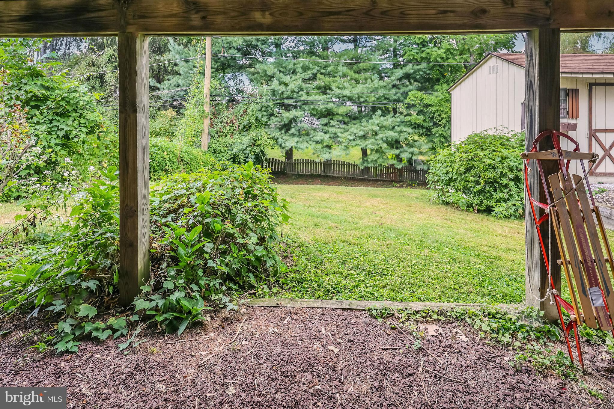 212 Golf Hills Road Havertown, PA 19083 - Photo 37 of 37 a view of a garden with a bench