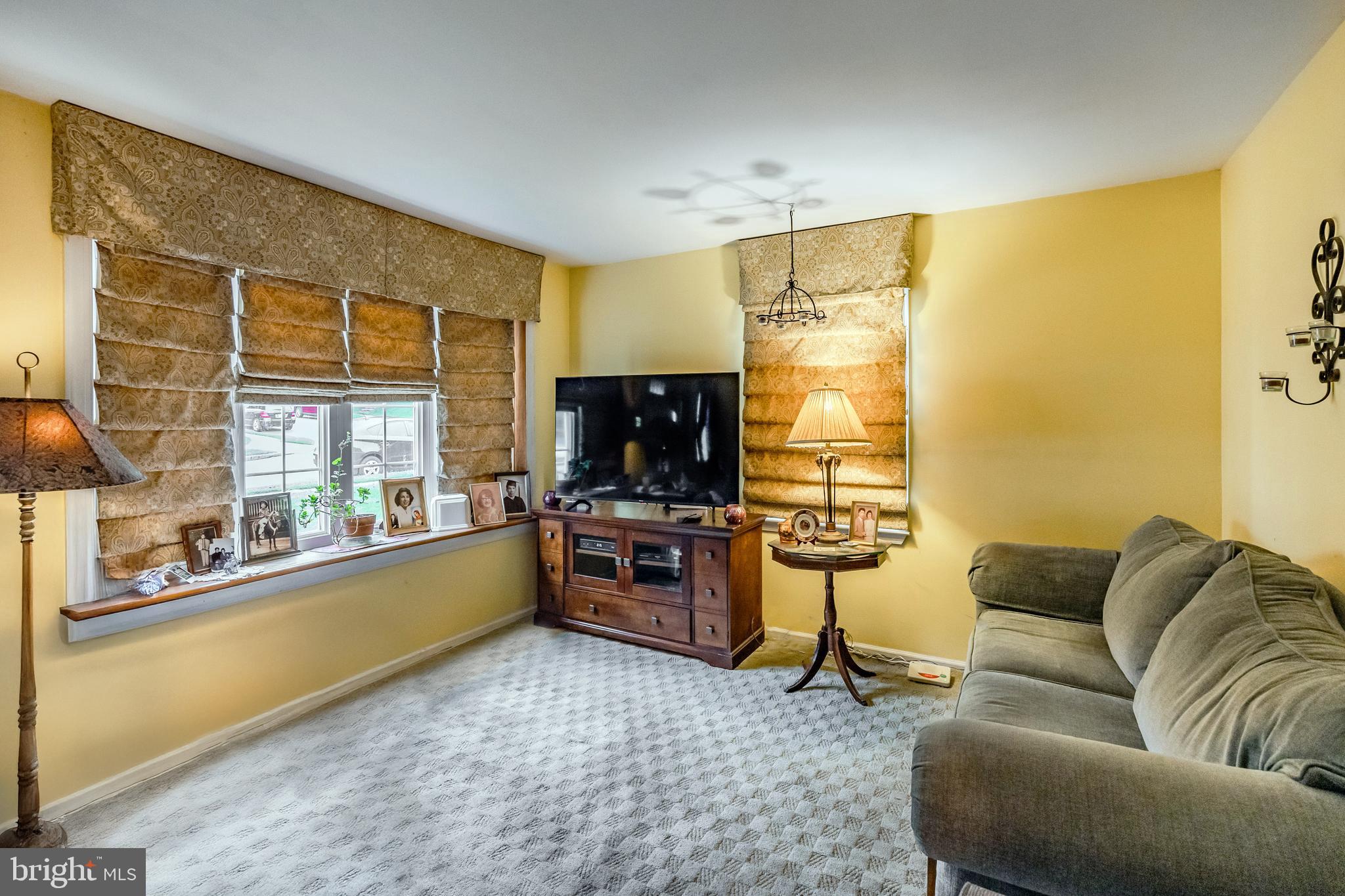 212 Golf Hills Road Havertown, PA 19083 - Photo 5 of 37 a living room with furniture and flat screen tv