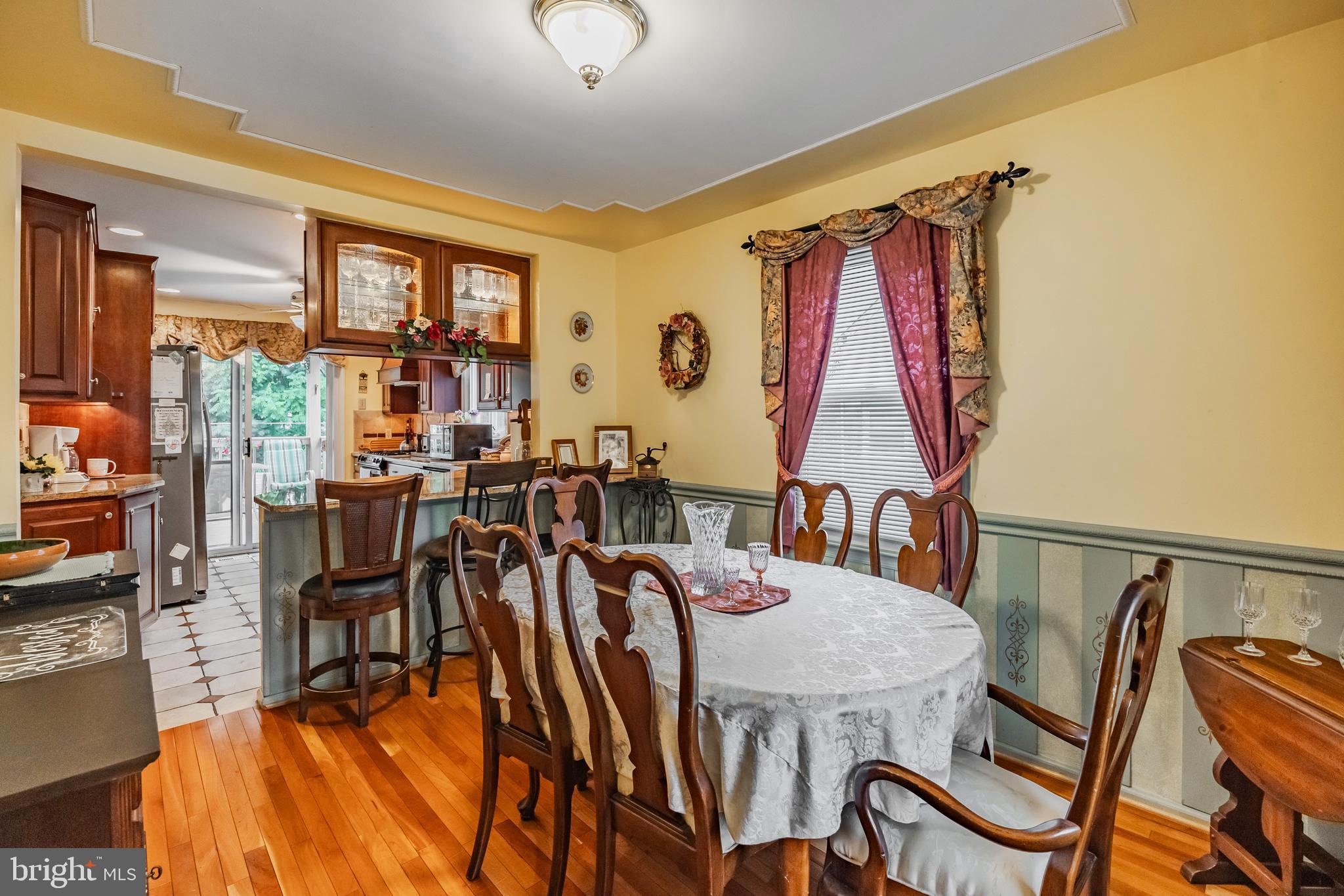 212 Golf Hills Road Havertown, PA 19083 - Photo 6 of 37 a view of a dining room with furniture window and wooden floor