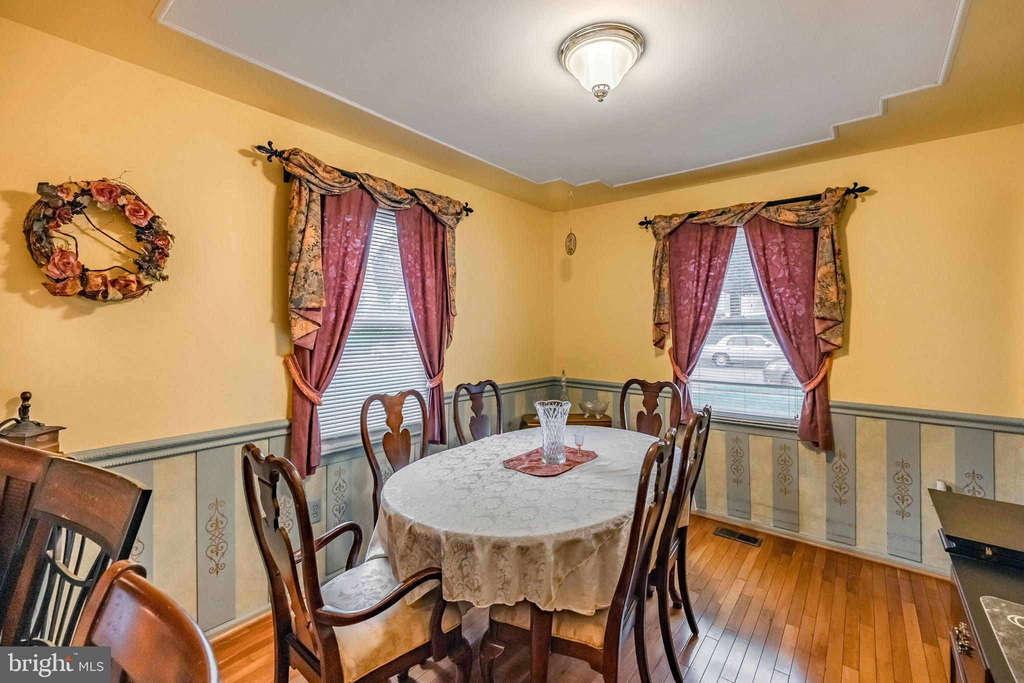 212 Golf Hills Road Havertown, PA 19083 - Photo 8 of 37 a view of a dining room with furniture window and wooden floor