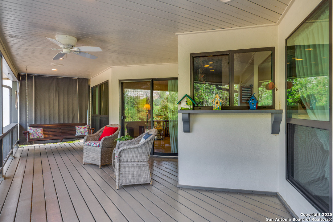 122 Cliffdwellers Path Boerne, TX 78006 - Photo 25 of 35 a living room with furniture and large windows