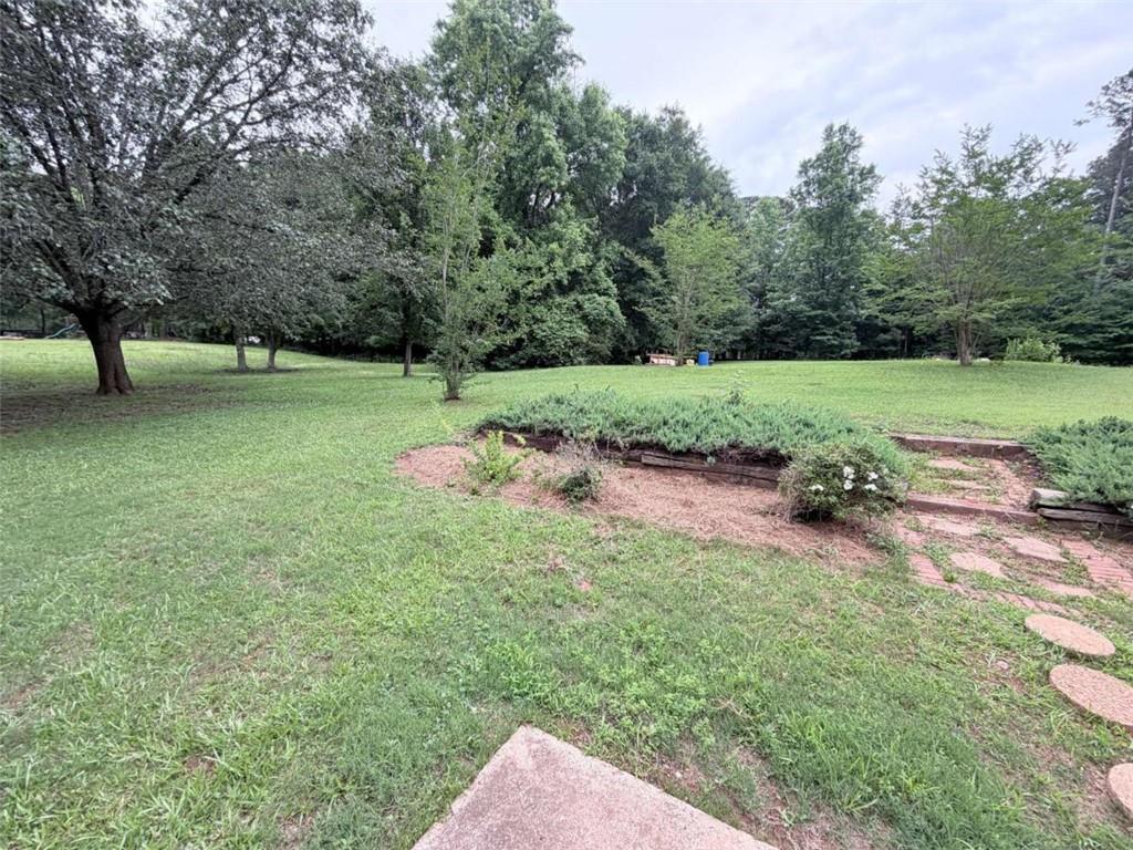 185 Roberts Road Covington, GA 30016 - Photo 22 of 25 a view of backyard with green space