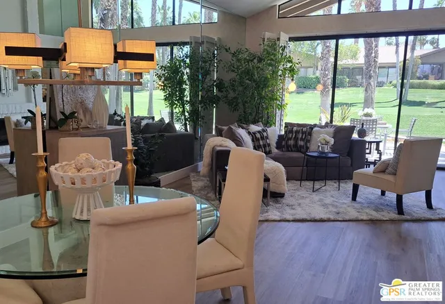 a kitchen with a sink and a potted plant