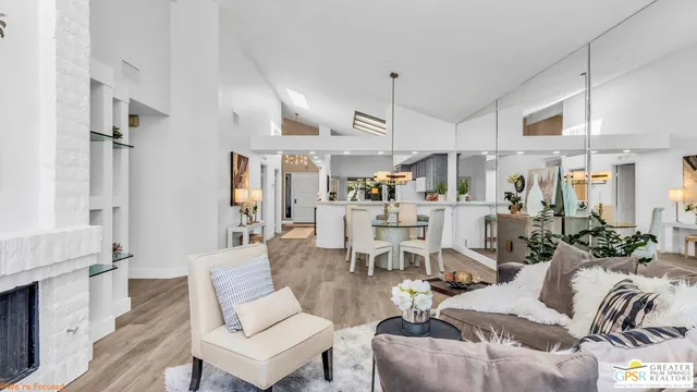 a bathroom with a granite countertop sink mirror vanity and toilet