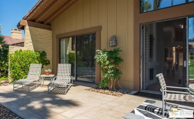 a bathroom with a bathtub and a window
