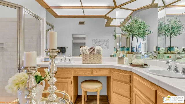 a view of swimming pool with outdoor seating and plants