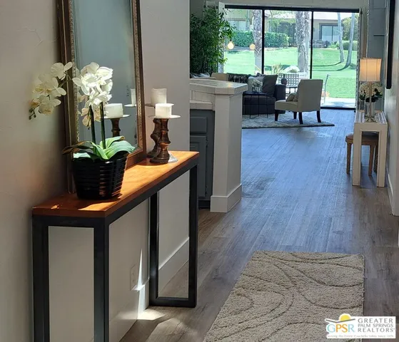 a kitchen with refrigerator and stove