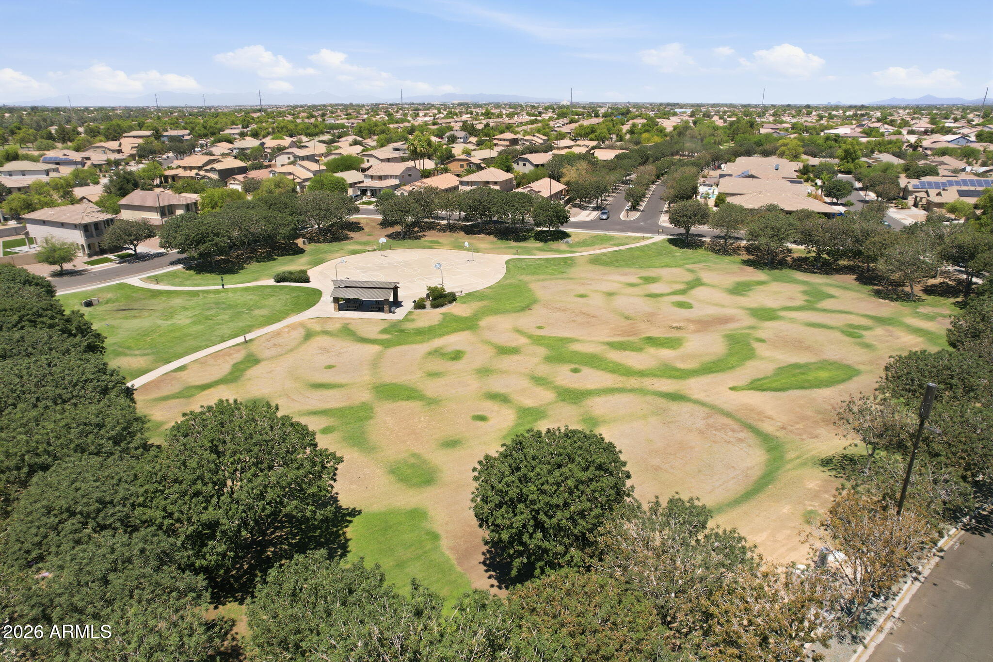 4184 East Trigger Way Gilbert, AZ 85297 - Photo 44 of 51 an aerial view of residential houses with outdoor space