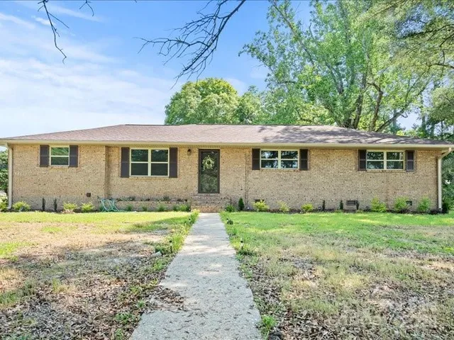 a view of a backyard with a garden