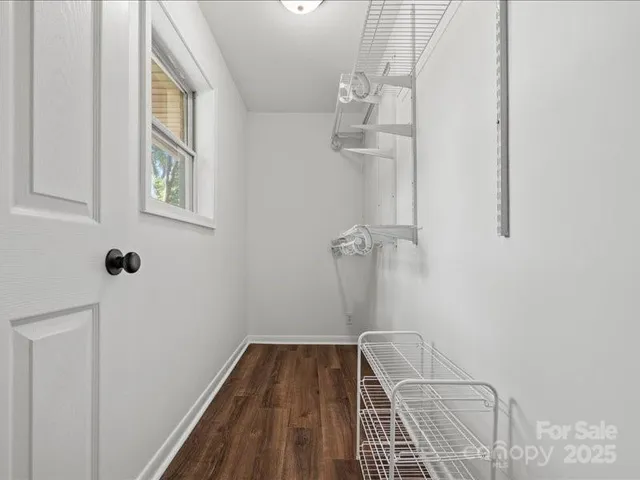 a view of a room with rack on the wall