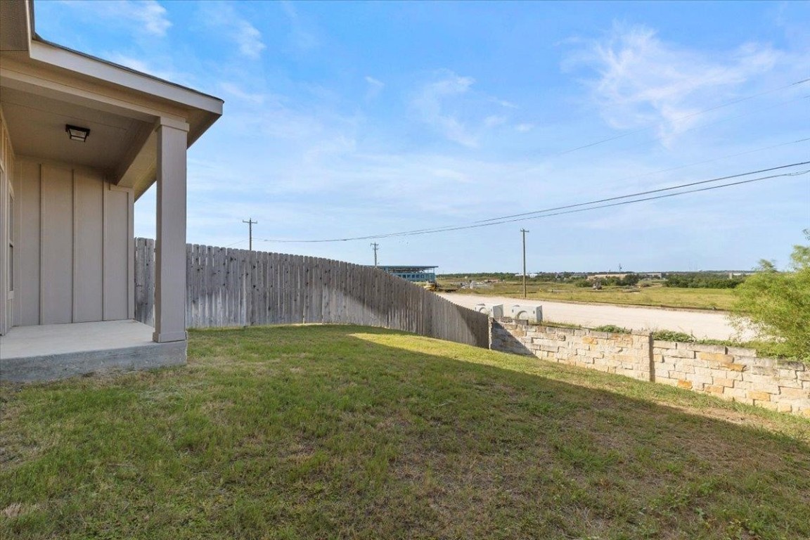128 Dodge Road Georgetown, TX 78626 - Photo 18 of 18 a view of a backyard with ocean view
