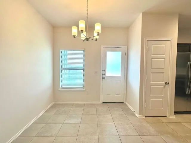 a view of an empty room with window