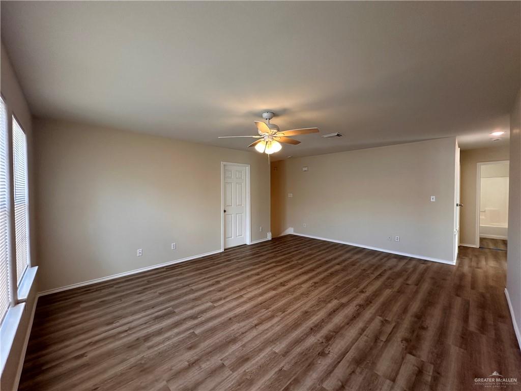 819 Briarwood Drive Mission, TX 78574 - Photo 10 of 19 a view of empty room with wooden floor